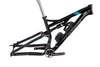 Side view of dual suspension mountain bike frame with 2 water bottle cages mounted as well as a spare tube using the Wolf Tooth B-RAD system