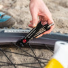 Wolf Tooth 8-Bit Pack Pliers use to tighten valve stem lock nut