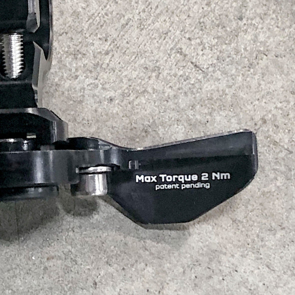 Back of Wolf Tooth ReMote dropper lever with text "Max Torque 2 Nm patent pending"