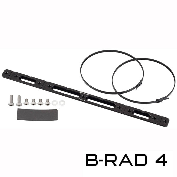Wolf Tooth B-RAD 4 with 2 zip ties, 2 longer mounting bolts, 4 shorter mounting bolts, 2 washers, and foam pad