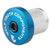Wolf Tooth compression plug with integrated 5mm spacer blue anodized stem cap.