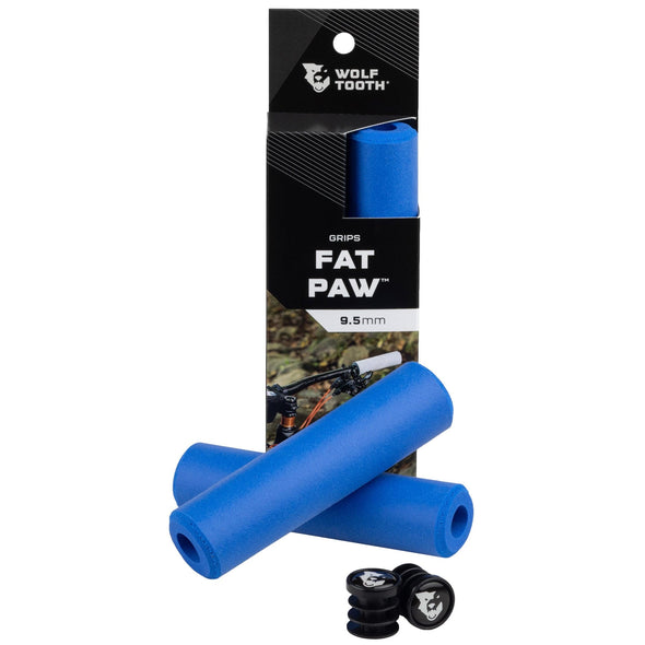 Wolf Tooth Fat Paw silicone grips inside and outside the packaging, shown in blue.
