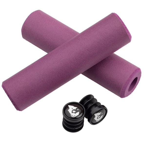 Wolf Tooth Fat Paw handlebar grips in purple with bar end plugs