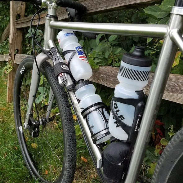 Wolf Tooth half bottle mount on dual suspension bike
