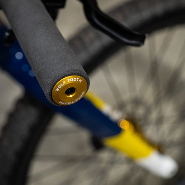 wolf Tooth Alloy bar end plugs installed gold