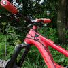 Black Wolf Tooth wolf head sticker on red Santa Cruz mountain bike